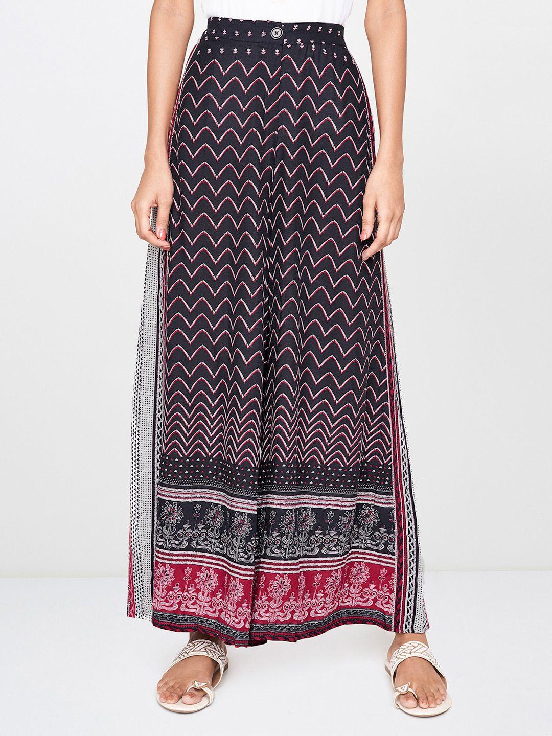 global desi women black & maroon printed flared palazzos