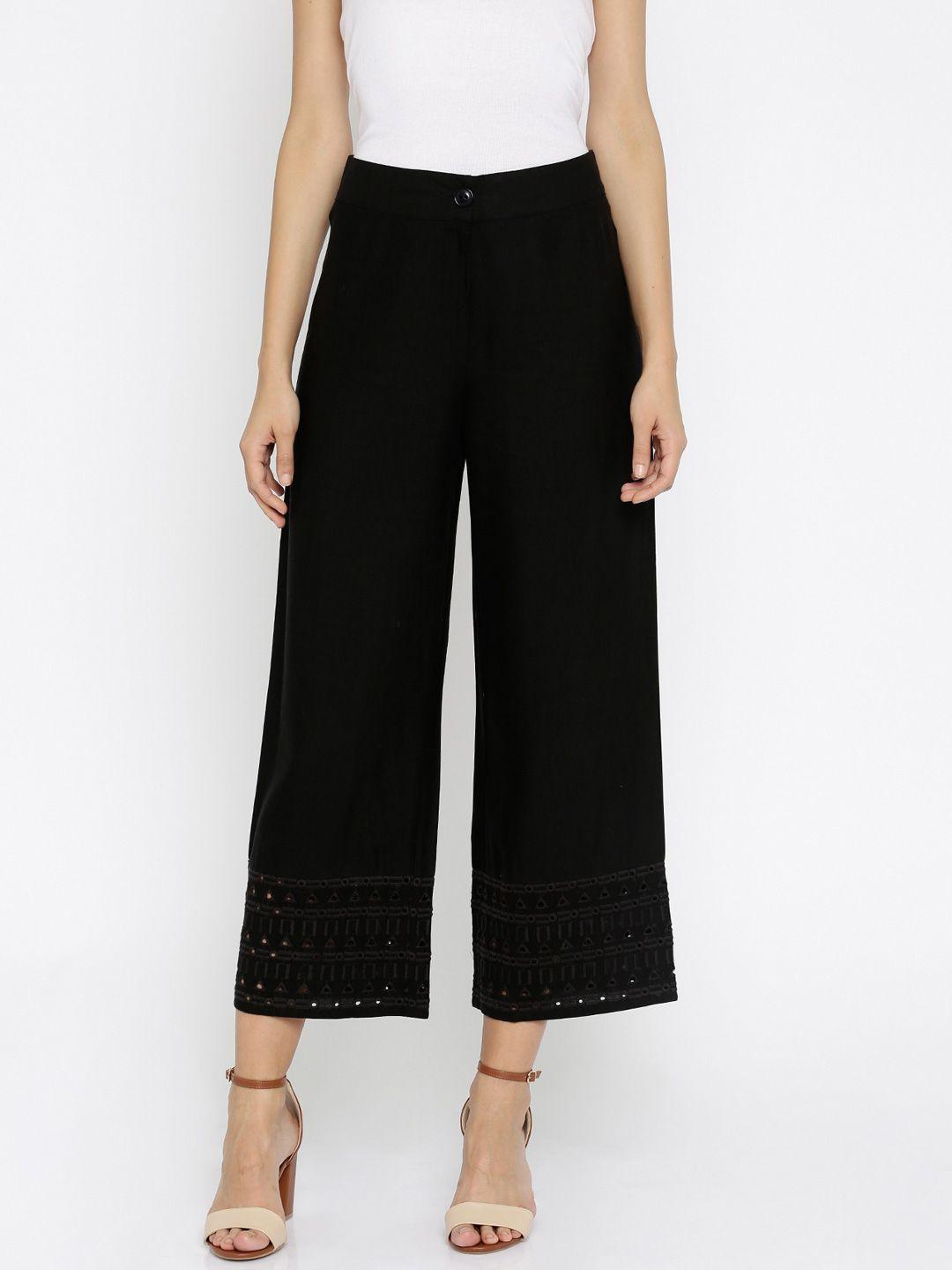 global desi women black solid parallel trousers