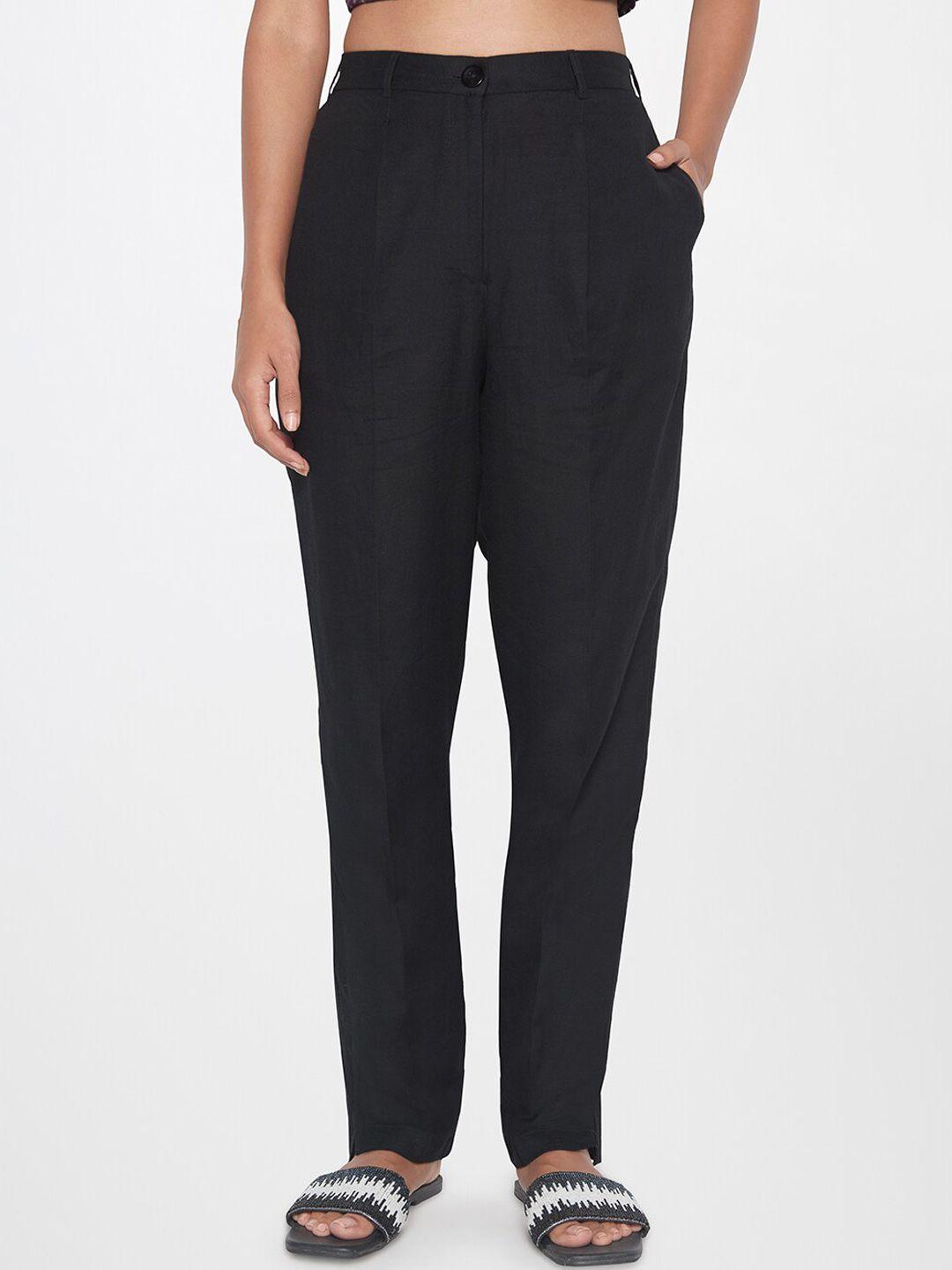 global desi women black tapered fit trousers