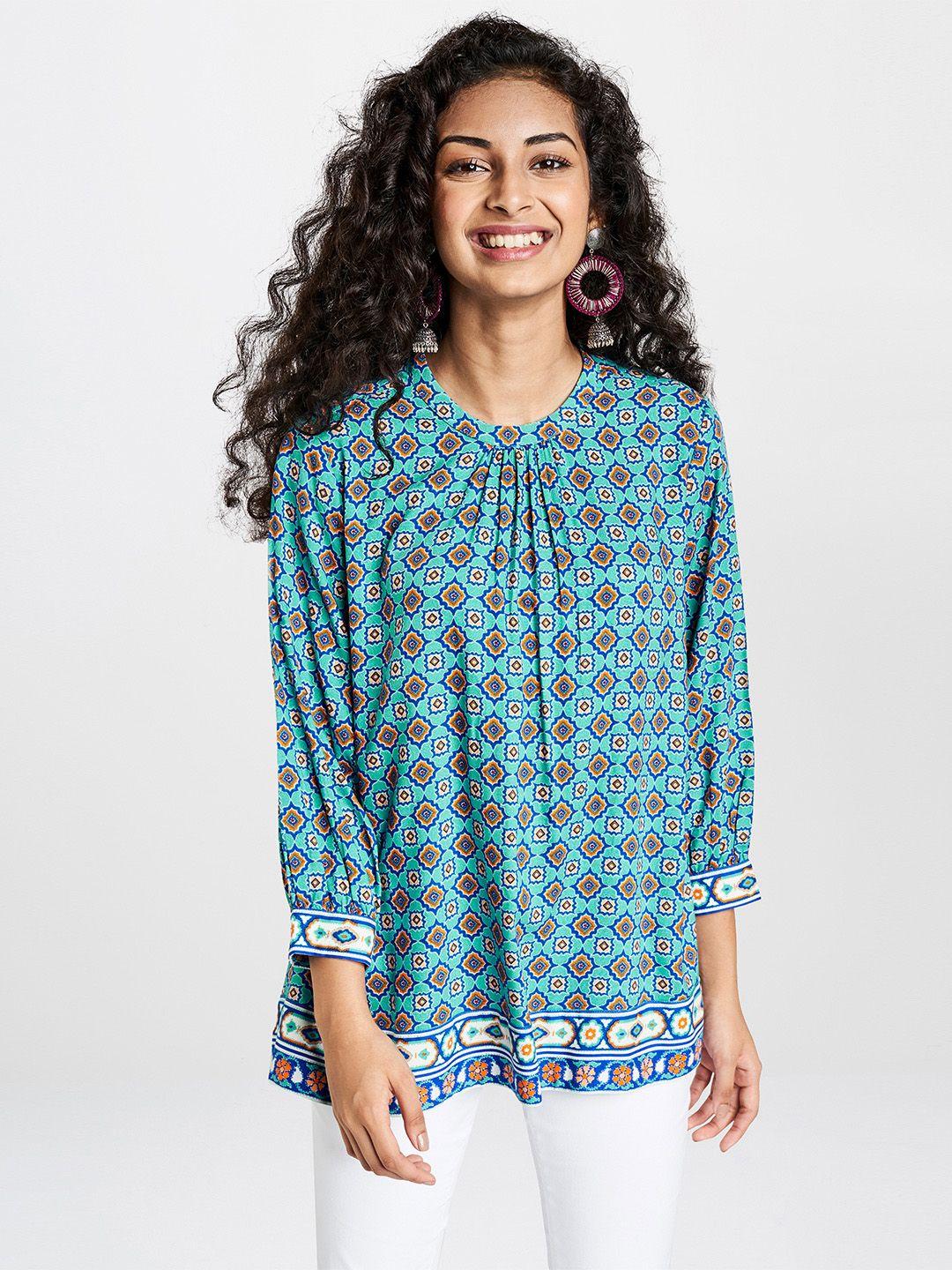 global desi women blue & orange geometric print a-line  top with gathers