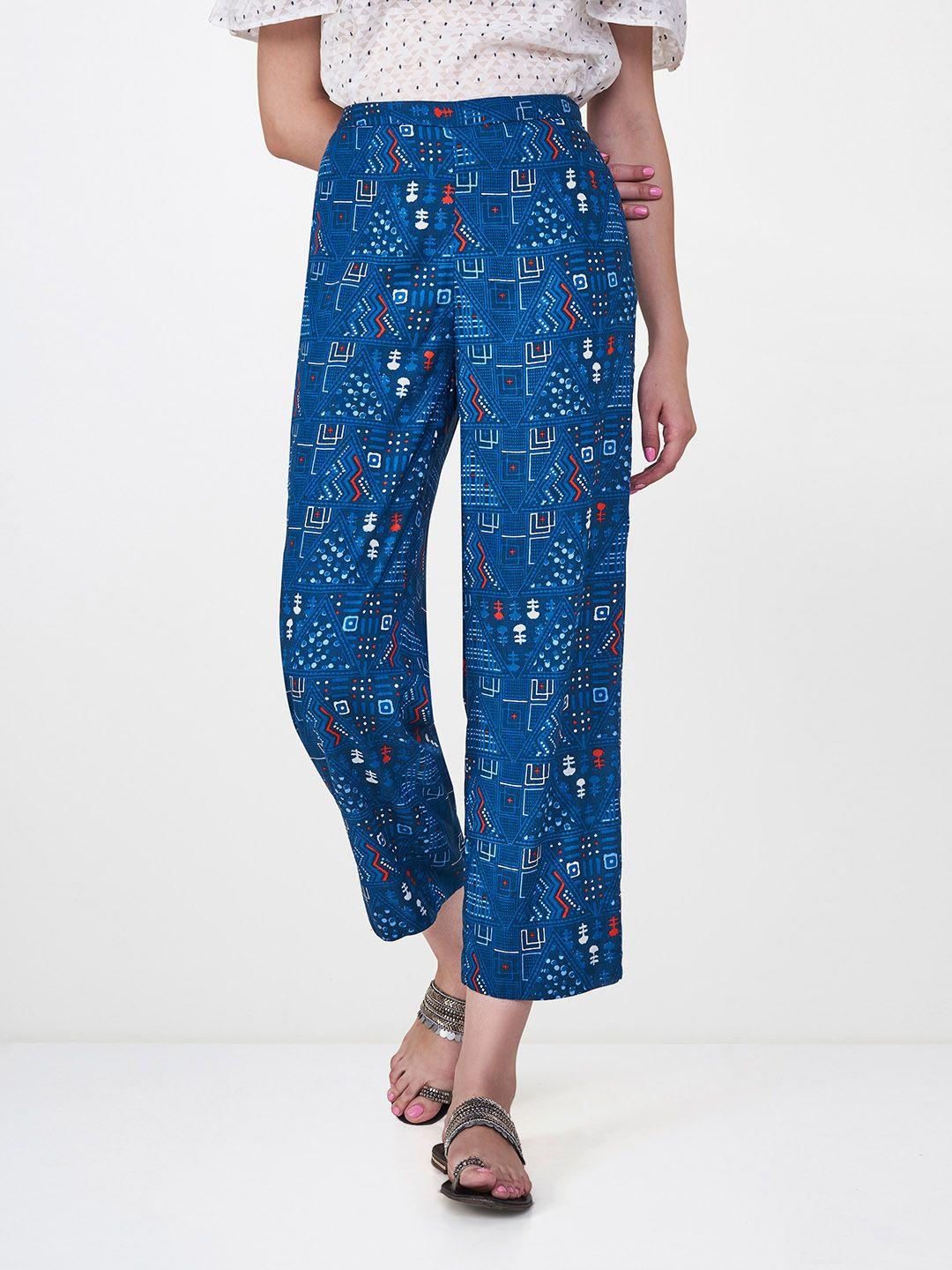 global desi women blue slim fit printed regular trousers