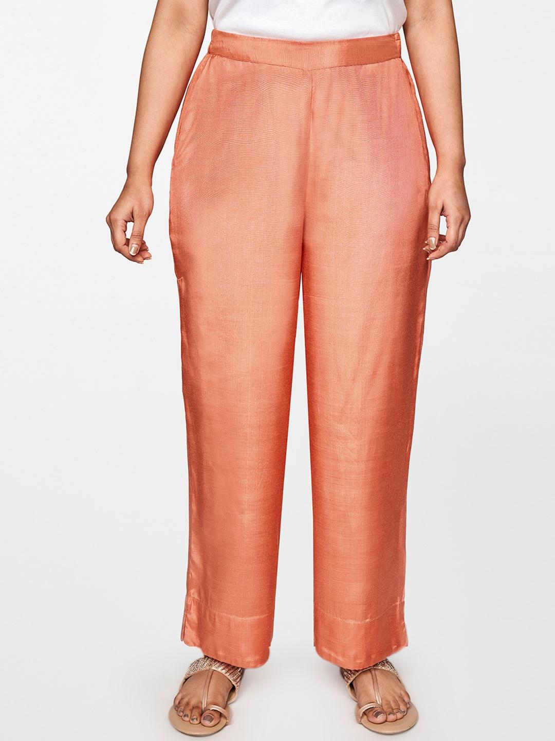 global desi women coral orange straight fit parallel trousers