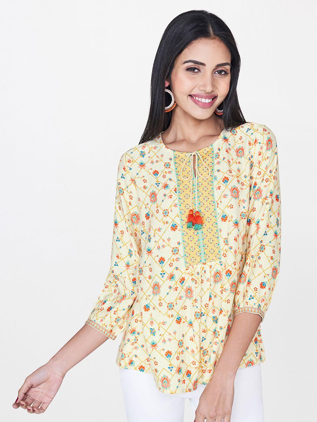 global desi women cream-coloured & peach-coloured floral print top