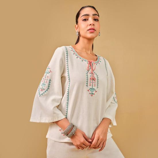 global desi women embroidered tie-up neck top