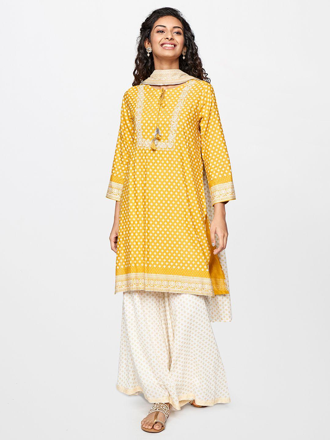 global desi women mustard yellow & gold-toned foil printed kurta with palazzos & dupatta