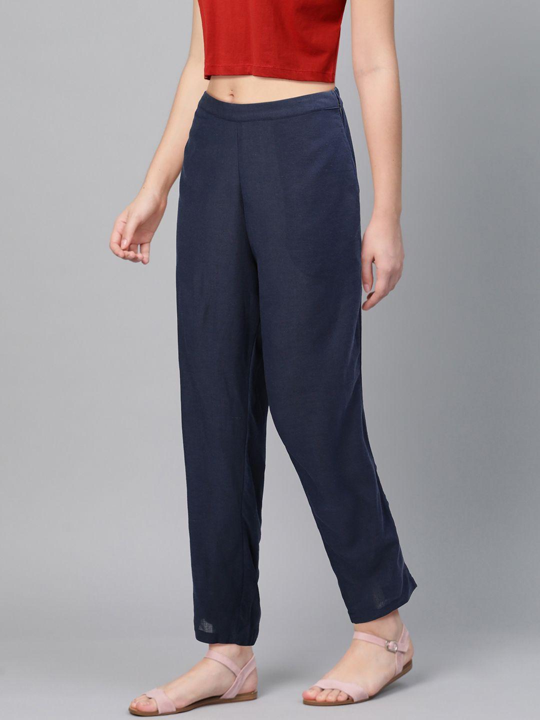 global desi women navy blue regular fit solid regular trousers