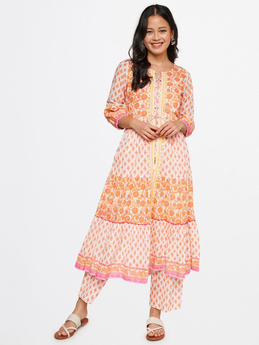 global desi women orange floral printed pure cotton kurta with trousers