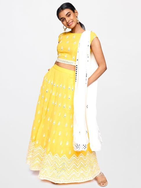 global desi yellow embroidered lehenga set