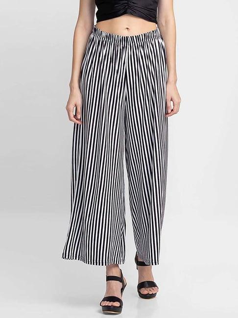 globus black & white striped flared trousers