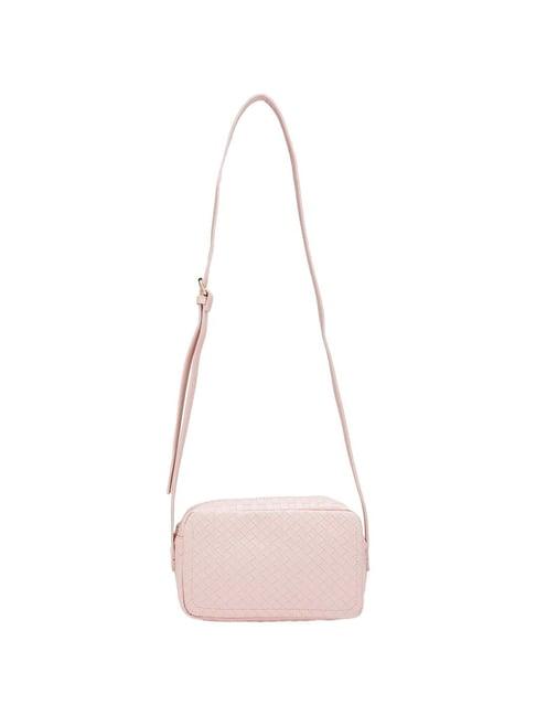 globus dusty pink textured medium sling handbag