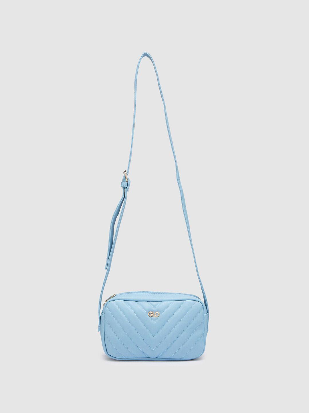 globus textured structured sling bag