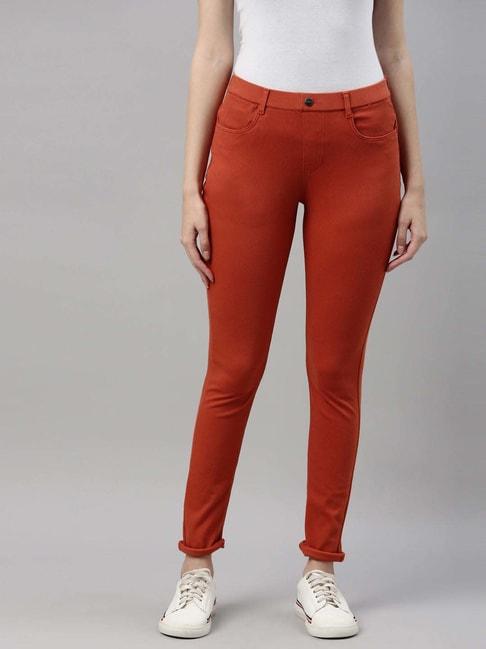go colors! rust mid rise jeggings