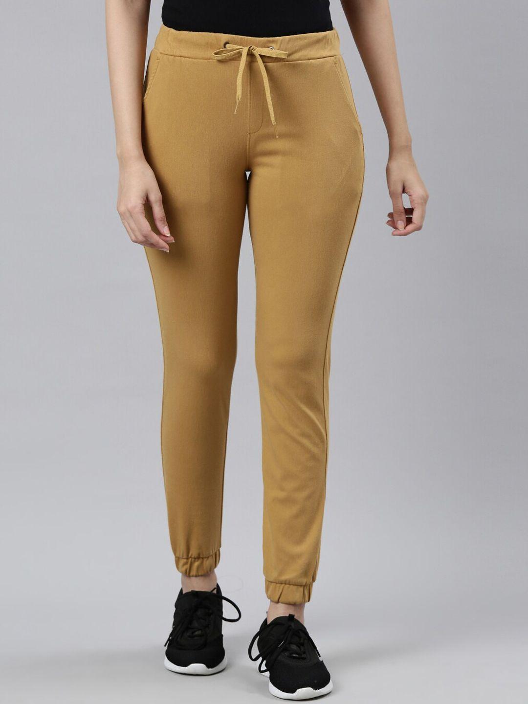 go colors women mustard-coloured solid sports joggers