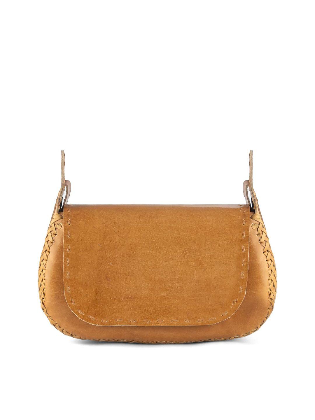 goatter tan leather structured sling bag with tasselled