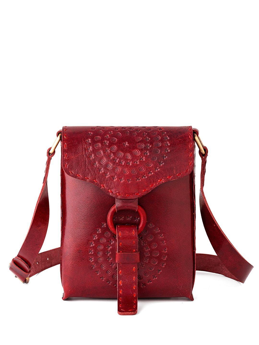 goatter textured structured leather sling bag