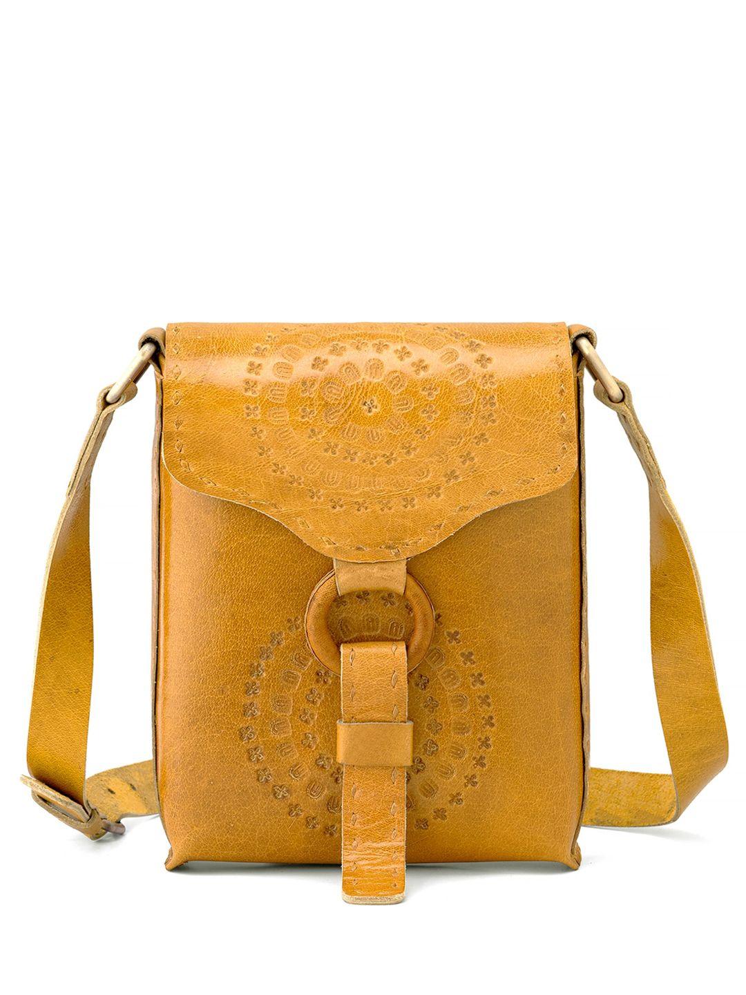 goatter textured structured leather sling bag
