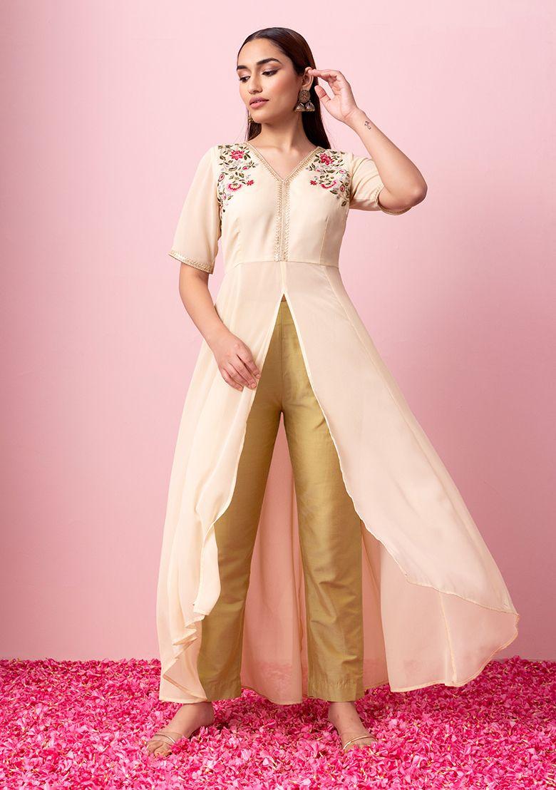 gold smocked back fitted pants