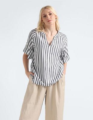 gold button vertical stripe top