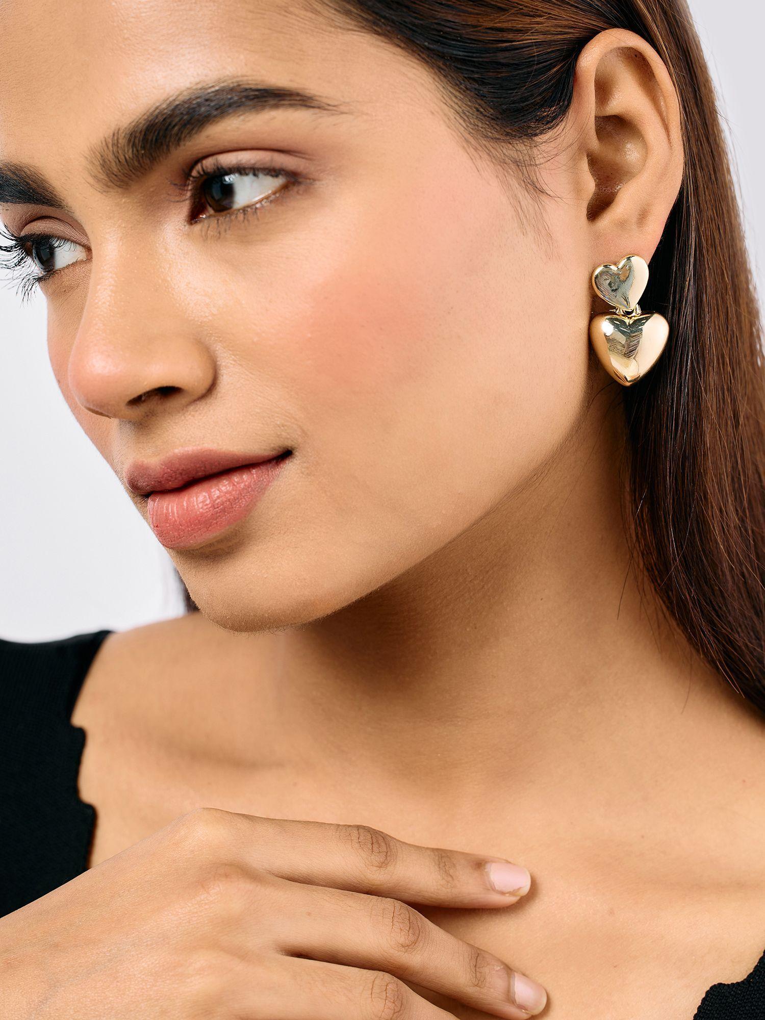 gold heart shaped drop earrings