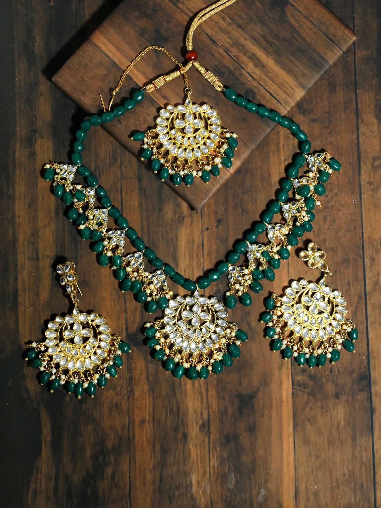 gold kundan green stone necklace with earrings and mangtikka (set of 3)