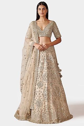 gold lehenga set with hand embroidery