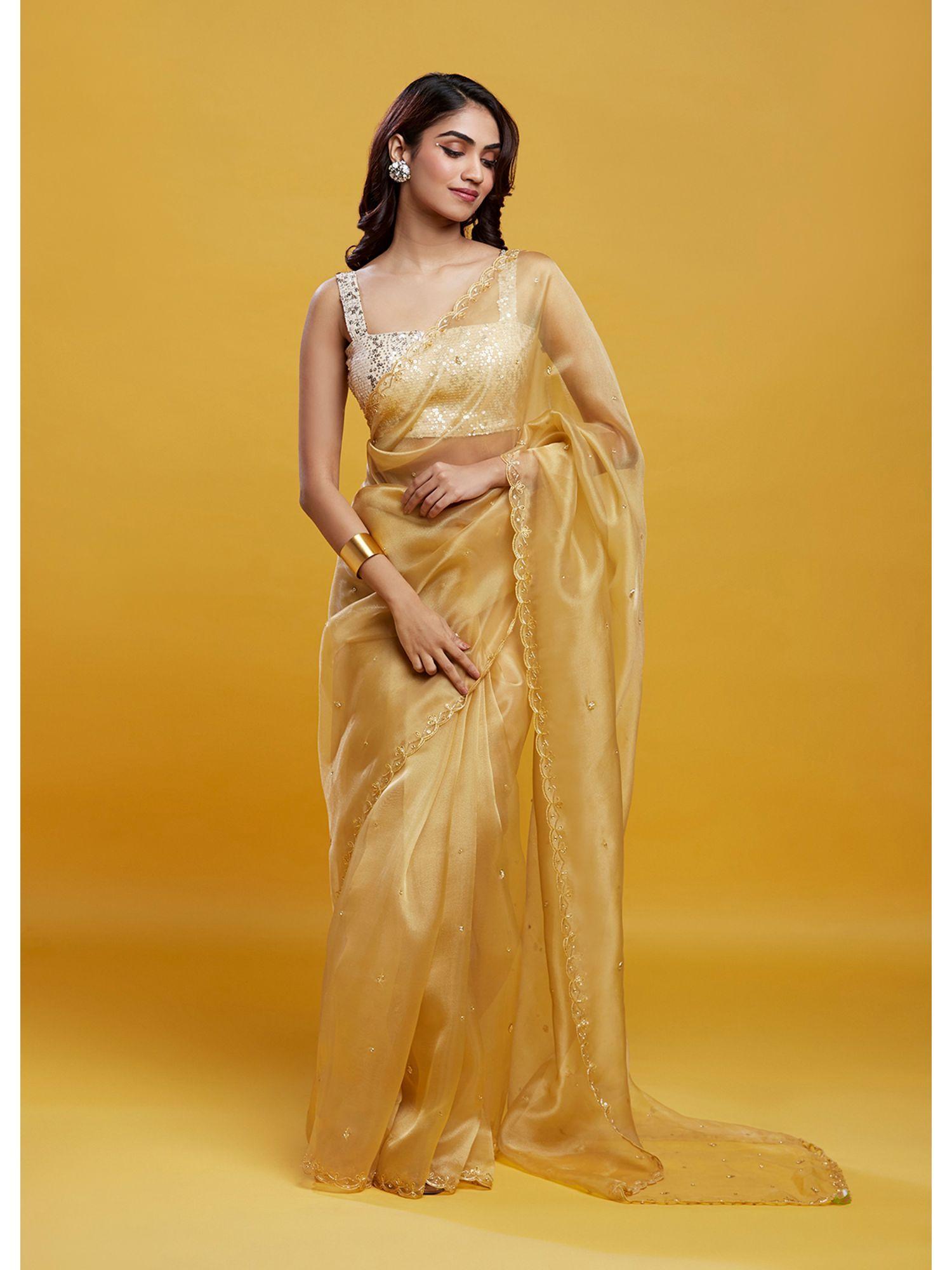 gold organza saree with stitched blouse