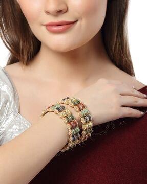 gold-plated beaded bangles