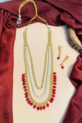 gold-plated kundan pearl studded layered necklace with earrings