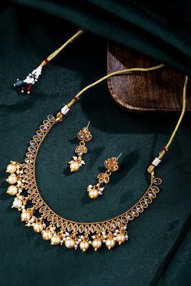 gold-plated pearl studded kundan jewellery set