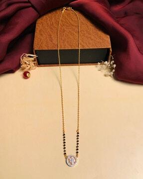 gold-plated beaded mangalsutra with floral pendant