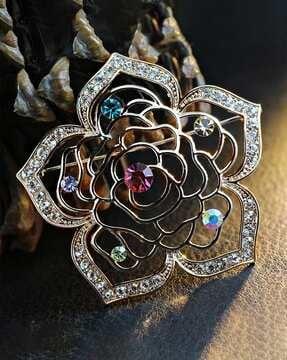 gold-plated crystal-studded brooch