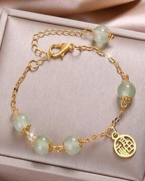 gold-plated crystal-studded link bracelet