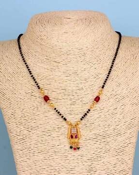 gold-plated crystal-studded tanmaniya mangalsutra