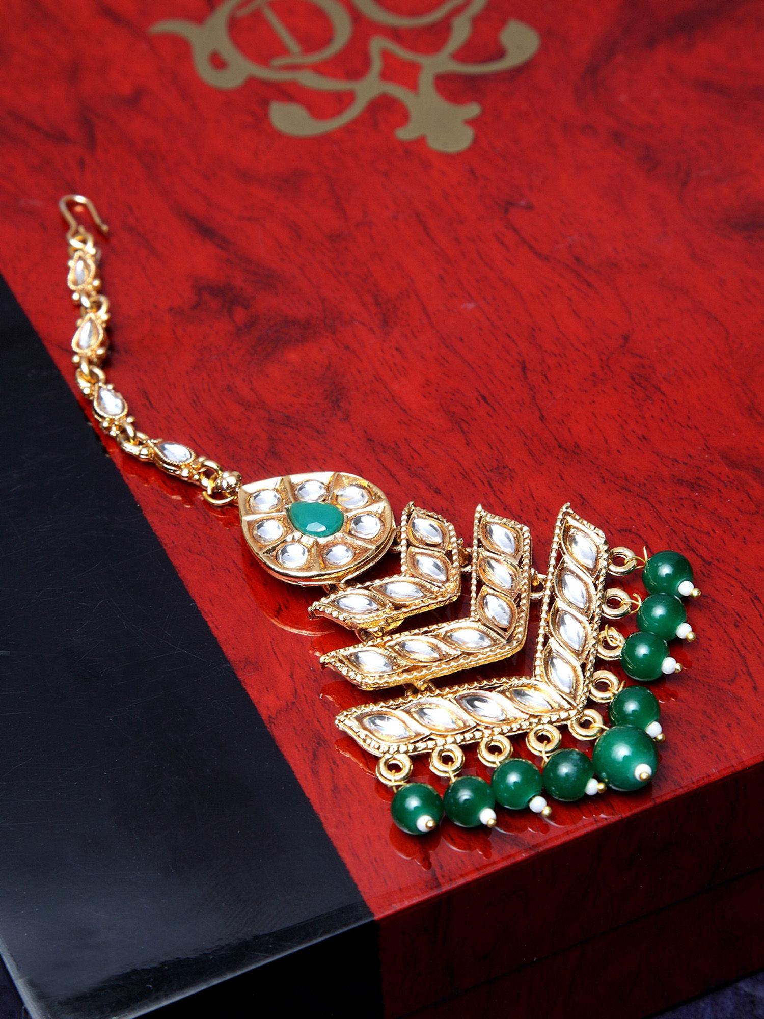 gold-plated green and white kundan-studded maang tikka