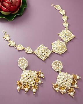 gold-plated kundan mathapatti with earrings