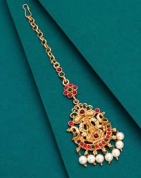 gold-plated kundan-studded mang tikka