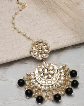 gold-plated kundan-studded mangtika