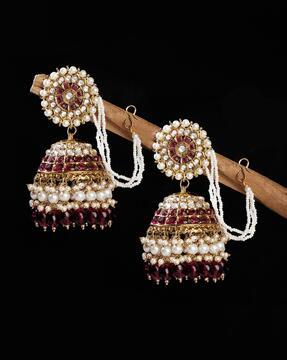 gold-plated kundan-studded pearl jhumka earrings