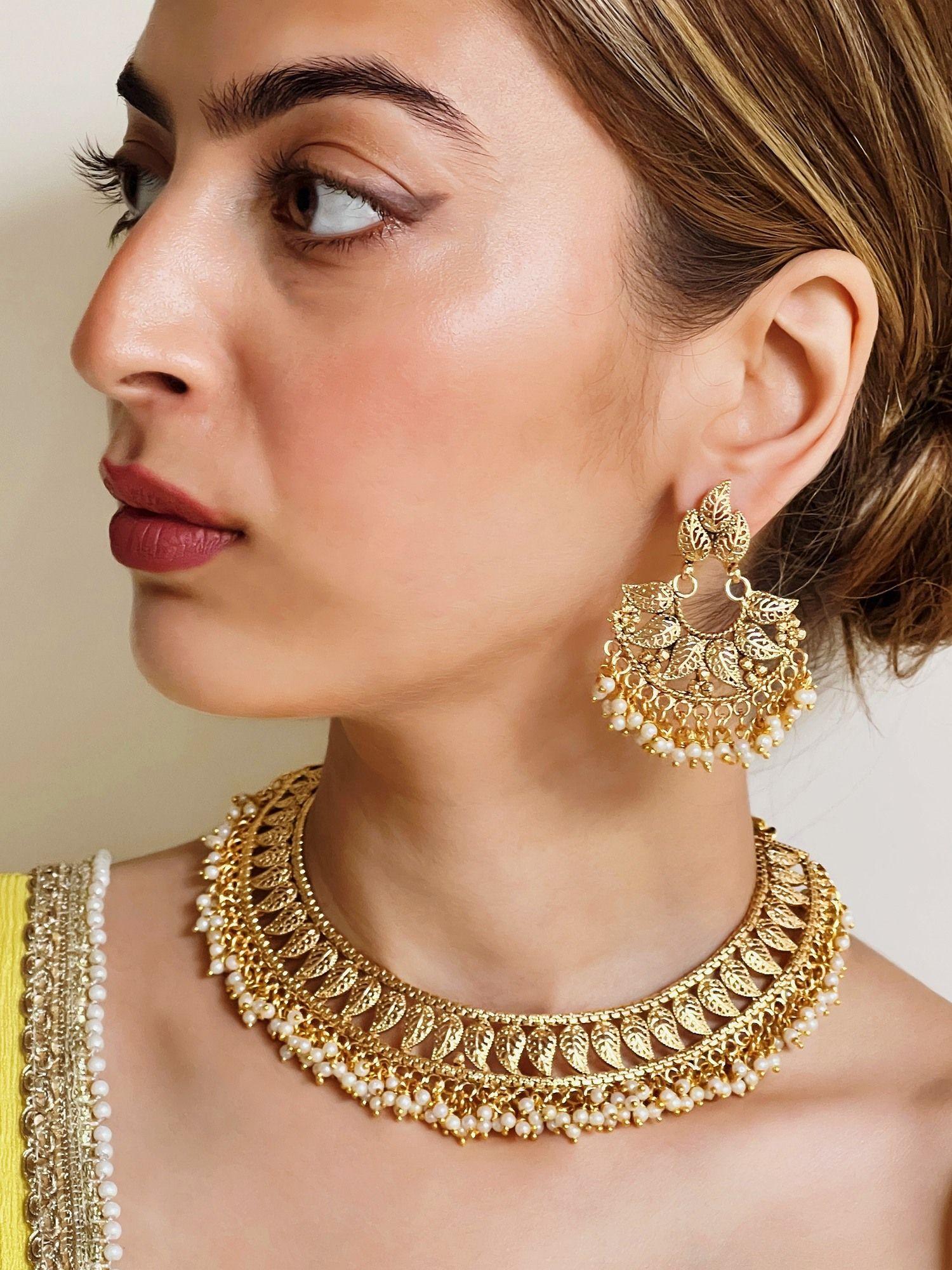 gold plated leaf patterned jewellery with pearl drops (set of 2)