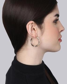 gold-plated metal hoop earrings