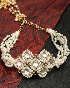 gold-plated pearl-studded link bracelet