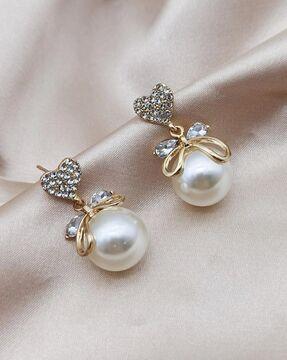 gold-plated pearl studs