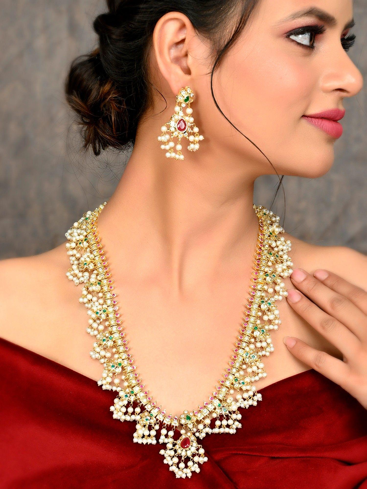 gold plated pink stone studded jewellery set