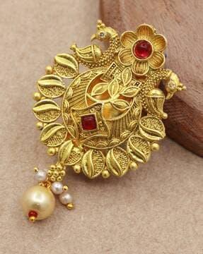 gold-plated stone-studded brooch