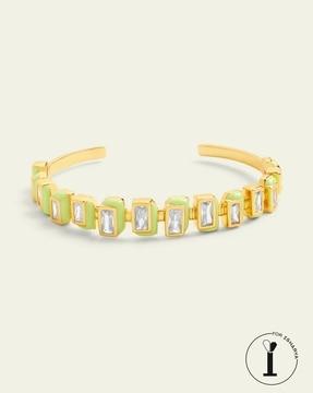 gold-plated stone-studded cuff bracelet