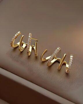 gold-plated stone-studded ear cuffs