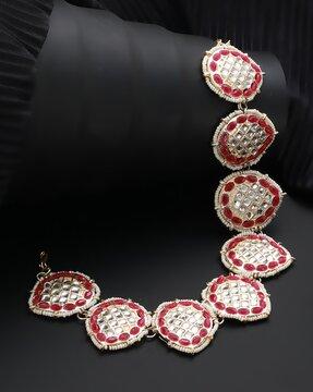 gold-plated stone-studded matha patti