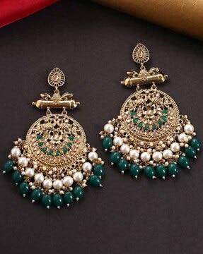 gold-plated stone-studded peacock dangler earrings