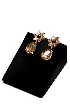 gold single earring hanging