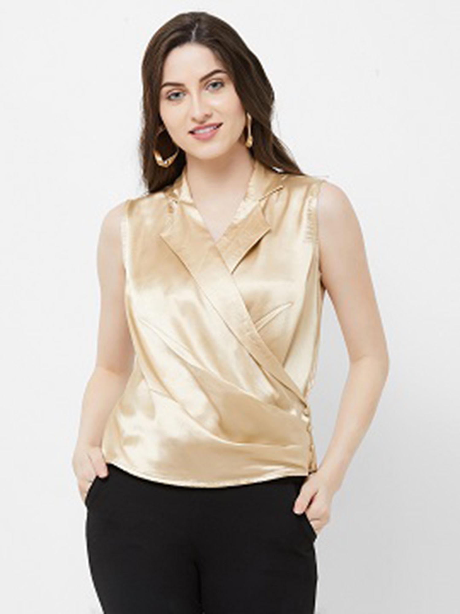 gold sleeveless top